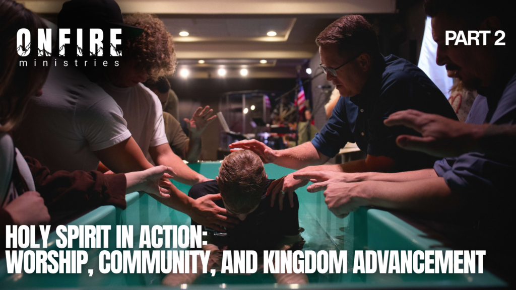 A person being baptized in a teal baptismal pool as multiple hands reach in to support them, surrounded by a church community. Bold white text reads: 'Holy Spirit in Action: Worship, Community, and Kingdom Advancement — Part 2.' On Fire Ministries logo in the upper left.